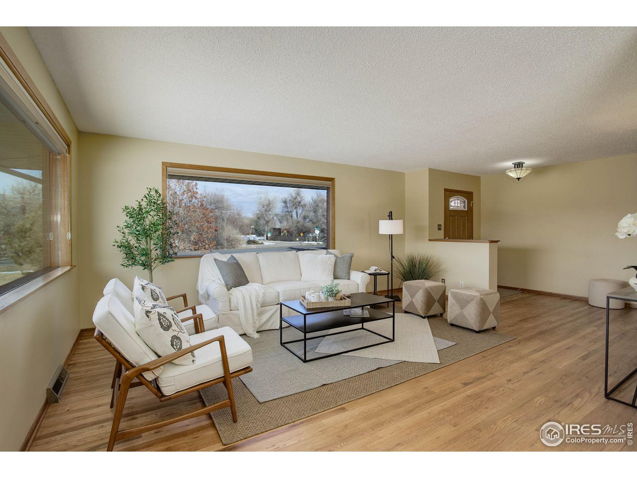 7714 Baseline Road Boulder, CO 80303 - Photo 6 of 38 a living room with furniture and a large window