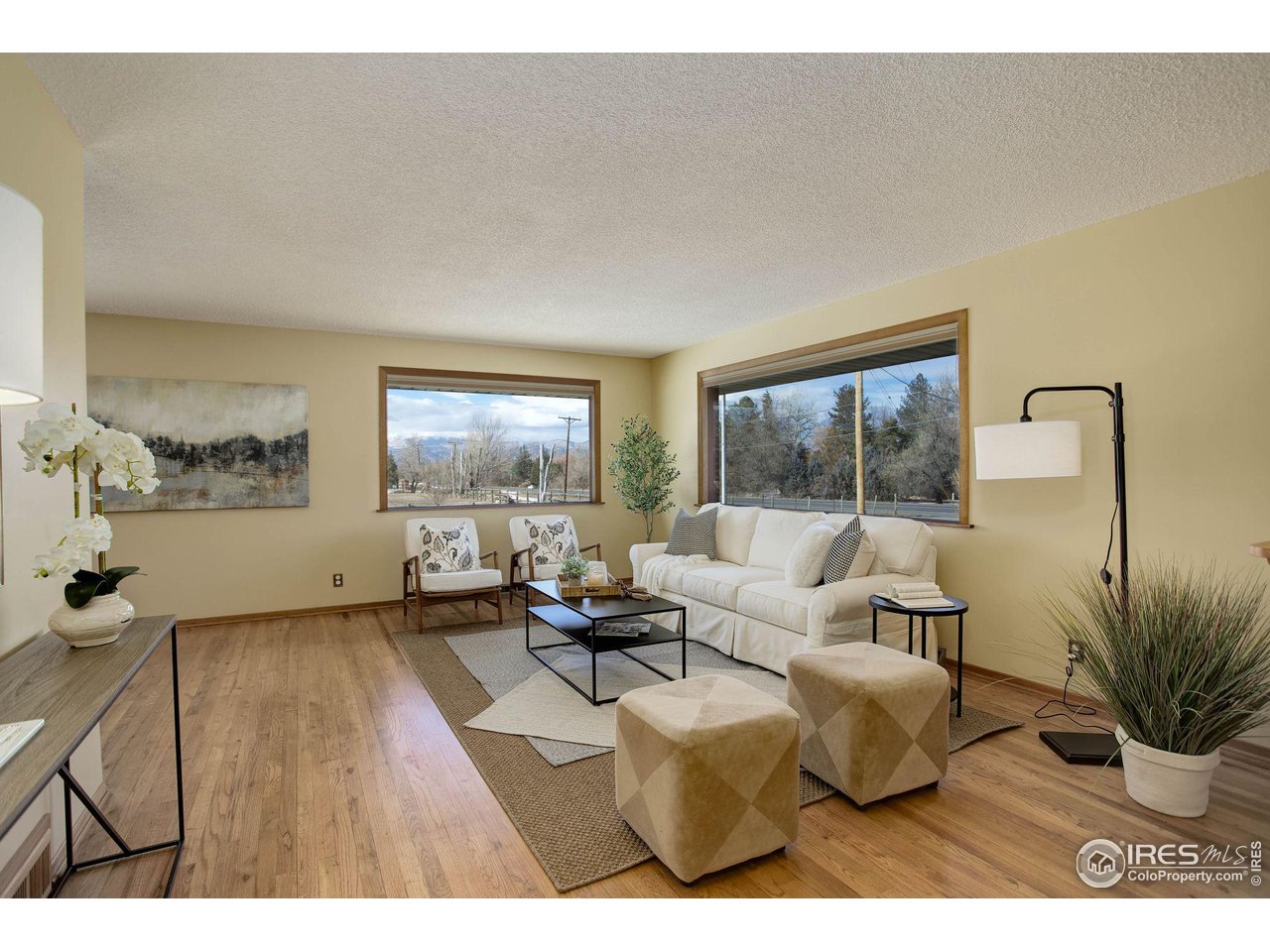 7714 Baseline Road Boulder, CO 80303 - Photo 9 of 38 a living room with furniture and a large window