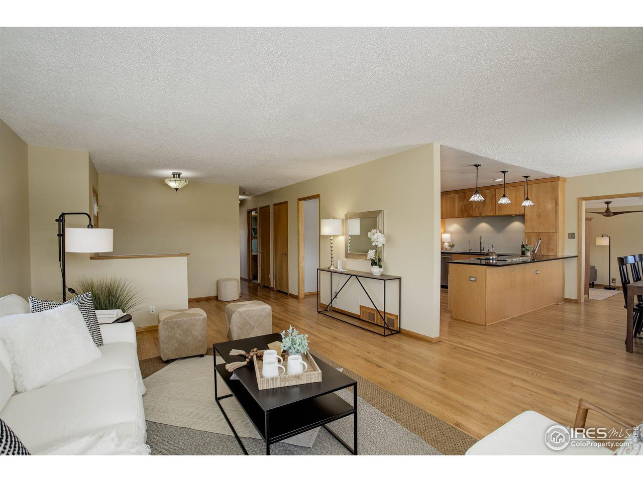7714 Baseline Road Boulder, CO 80303 - Photo 10 of 38 a living room with furniture and a wooden floor