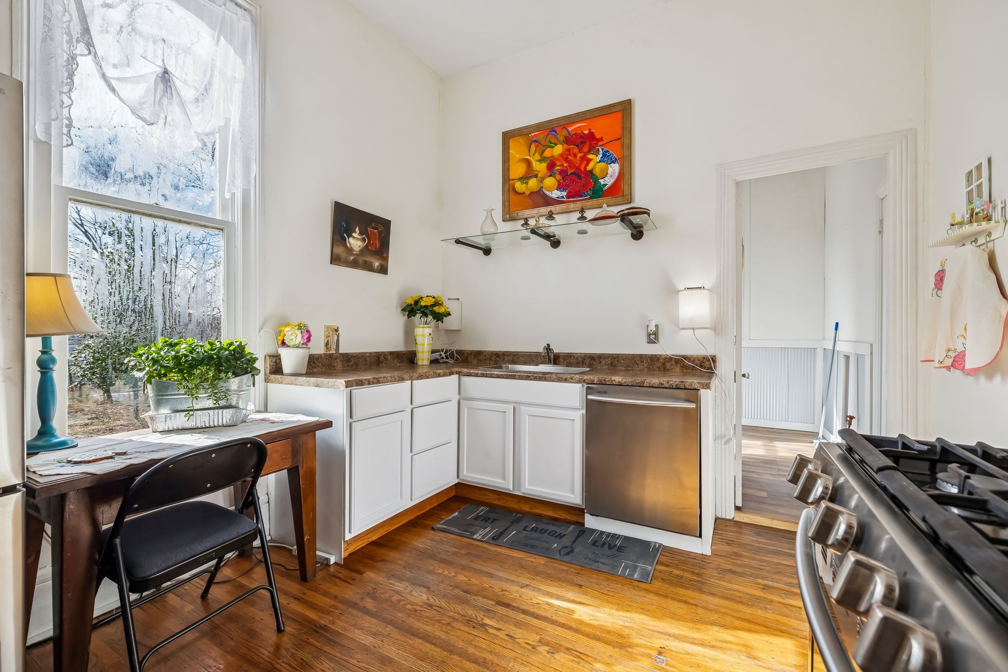 375 Highway 13 Waverly, TN 37185 - Photo 17 of 80 a kitchen with stainless steel appliances a stove a sink and a refrigerator