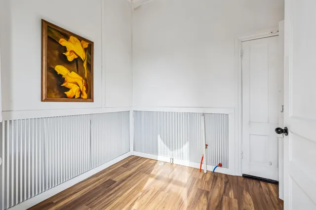 a bedroom with furniture and a fireplace