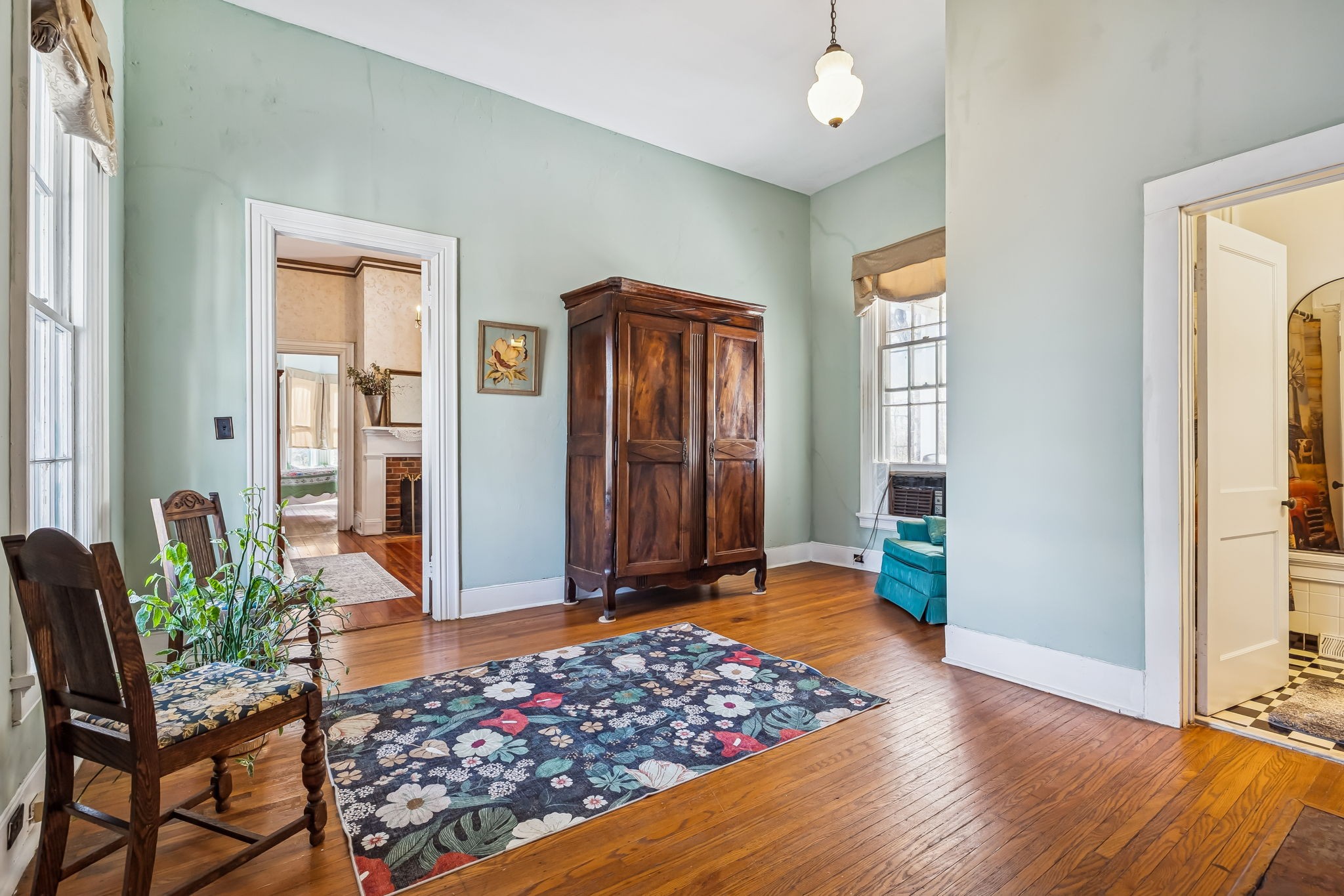 375 Highway 13 Waverly, TN 37185 - Photo 23 of 78 a view of a livingroom with wooden floor and chair