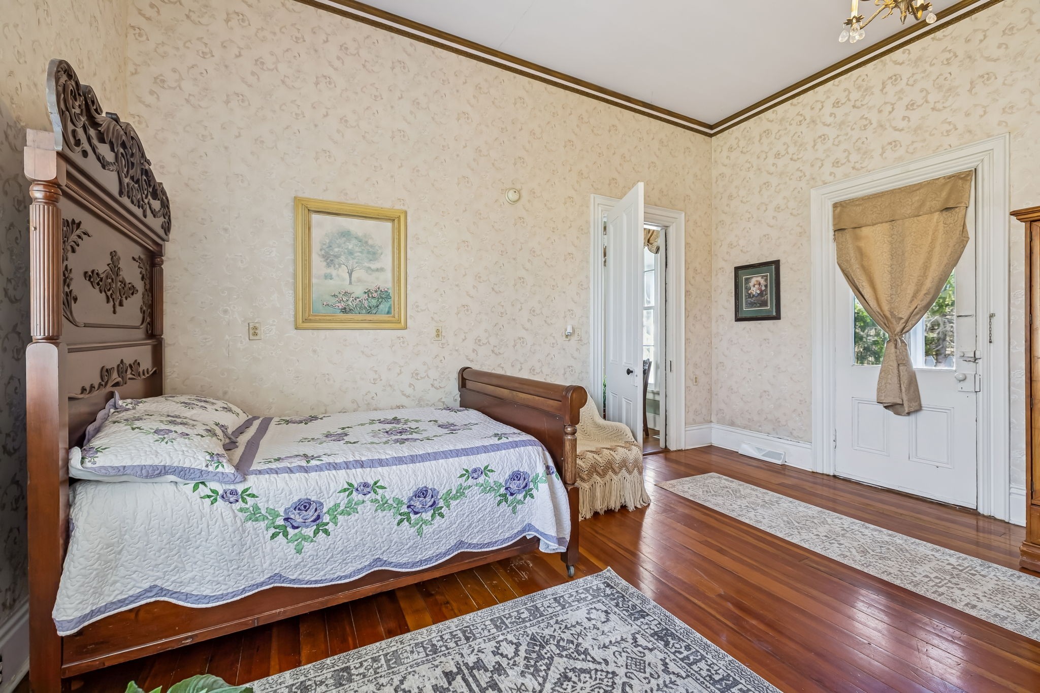 375 Highway 13 Waverly, TN 37185 - Photo 30 of 80 a bedroom with a bed and wooden floor