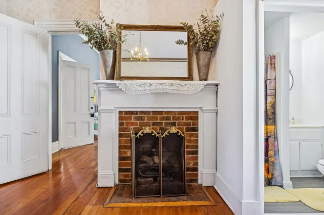 a view of a door of a house with wooden floor