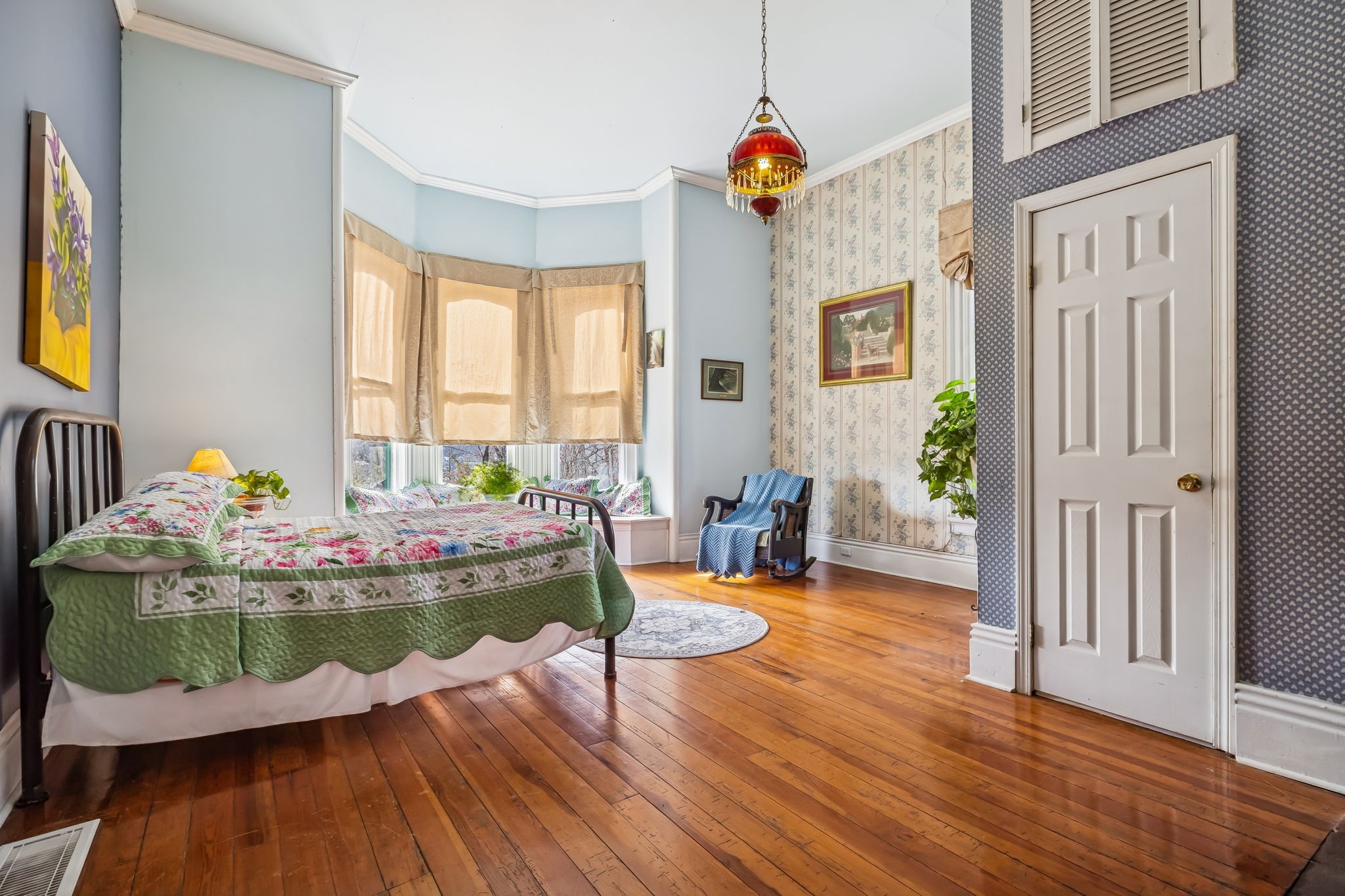 375 Highway 13 Waverly, TN 37185 - Photo 32 of 80 a living room with dining room and wooden floor