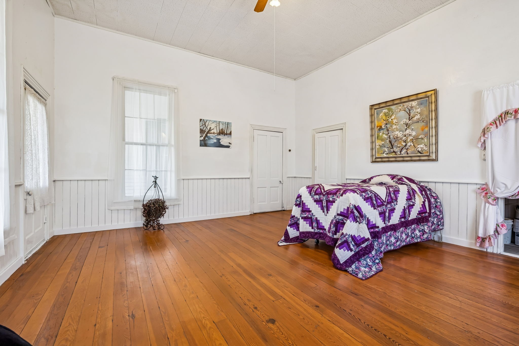 375 Highway 13 Waverly, TN 37185 - Photo 42 of 78 a bedroom with a bed and wooden floor