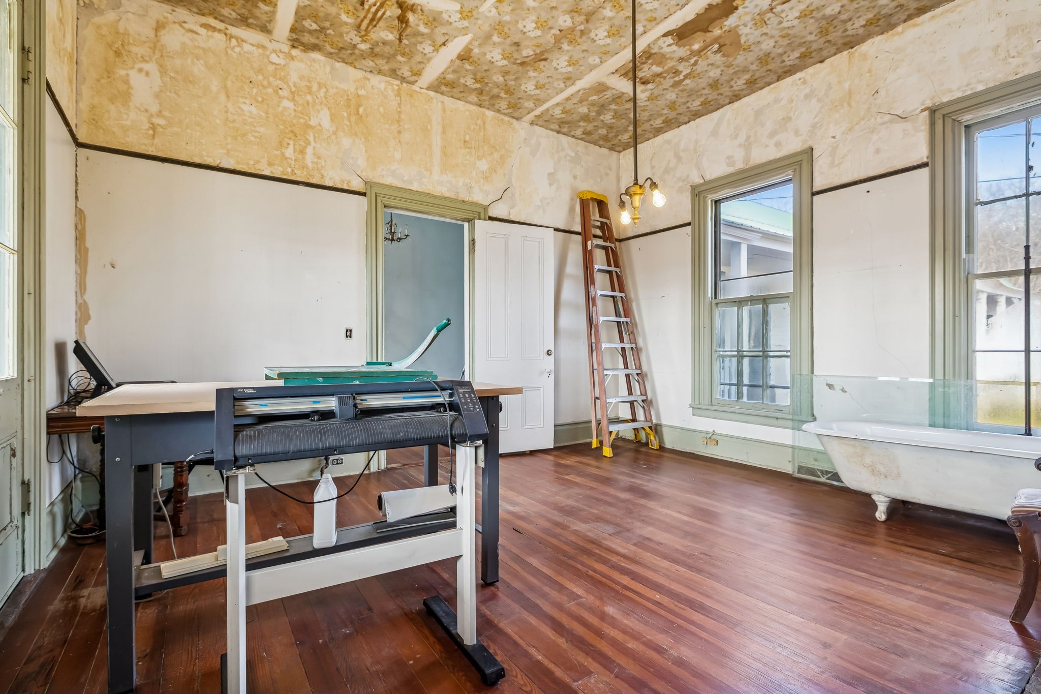 375 Highway 13 Waverly, TN 37185 - Photo 46 of 78 an empty room with wooden floor and windows