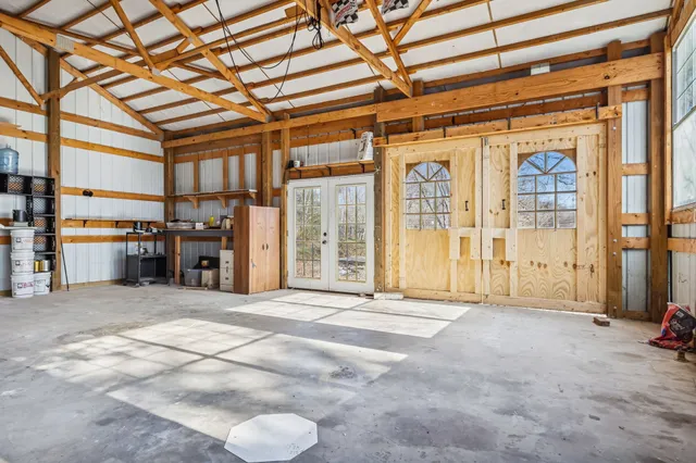 a view of a door of a house with wooden floor