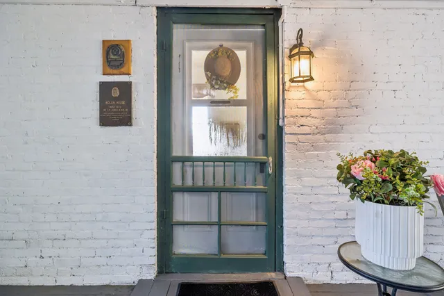 a kitchen with stainless steel appliances a stove a sink and a refrigerator