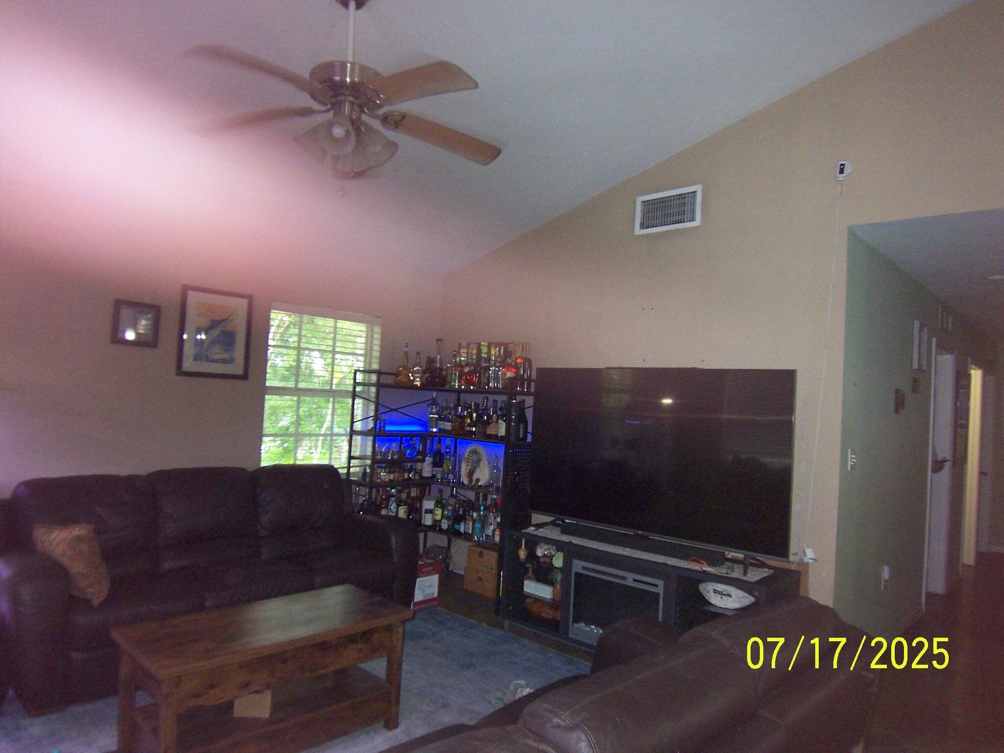 Undisclosed Address Key Largo, FL 33037 - Photo 2 of 19 a living room with furniture and a flat screen tv