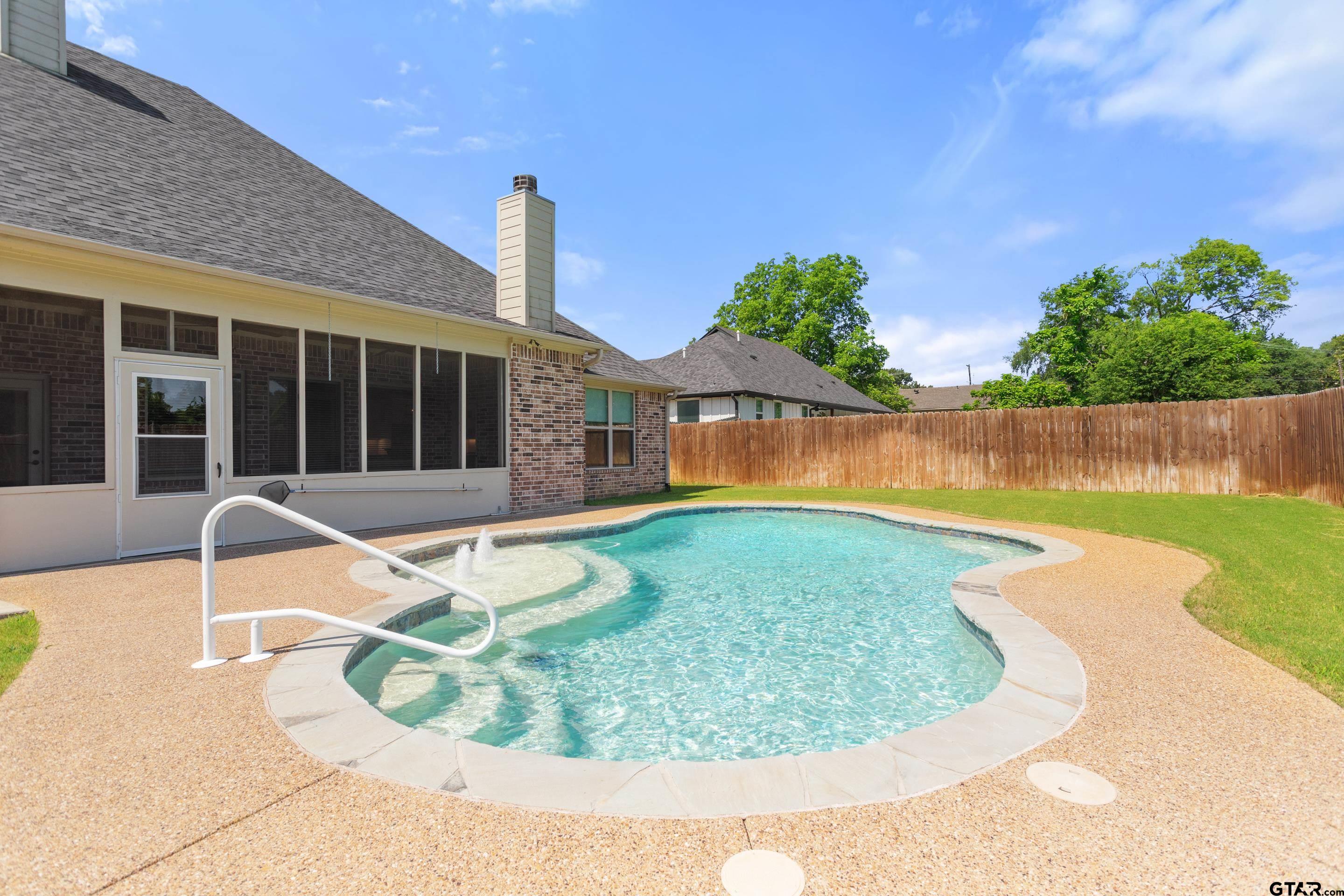 105 Nathan Road Chandler, TX 75758 - Photo 31 of 36 a view of a swimming pool with lounge chair