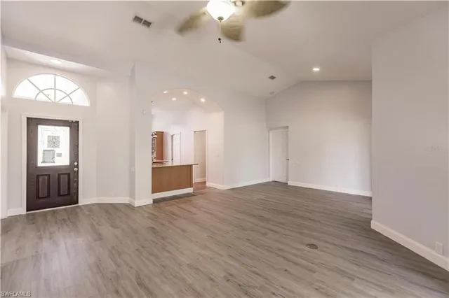 a view of kitchen with stainless steel appliances refrigerator stove and oven