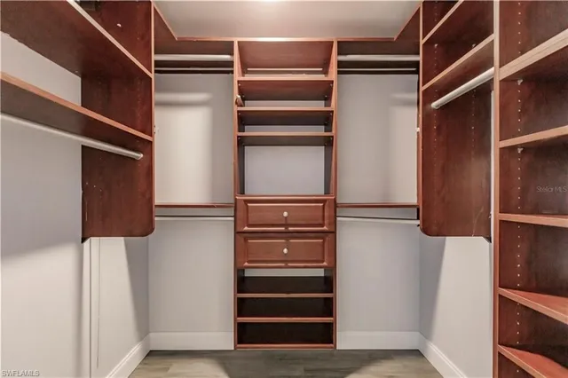 a view of a house with a yard and garage