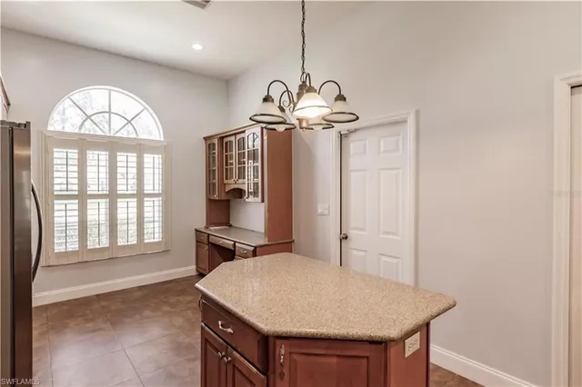 a view of a livingroom with furniture window and wooden floor