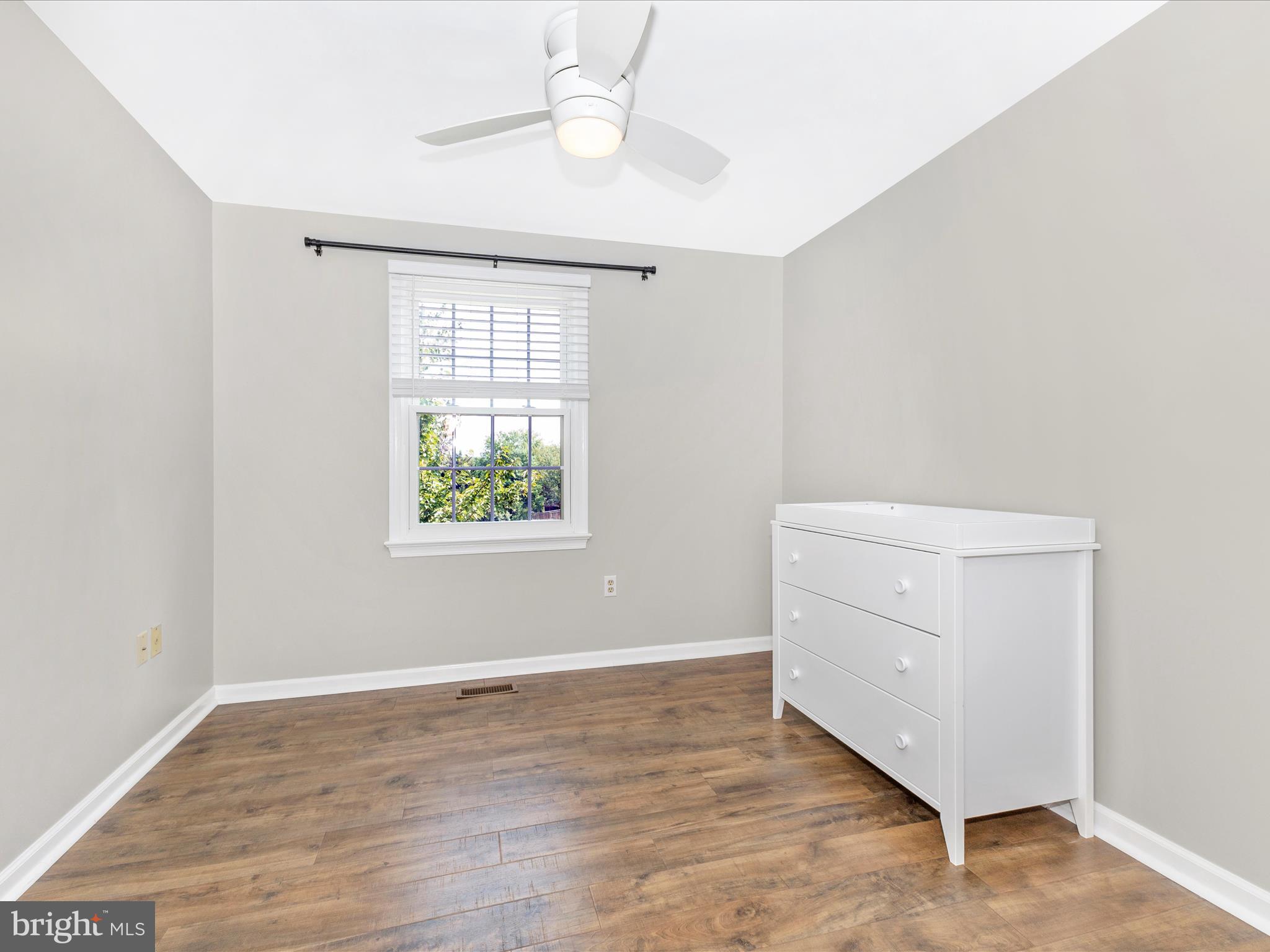 8204 Red Wing Court Frederick, MD 21701 - Photo 24 of 72 wooden floor in an empty room with a window