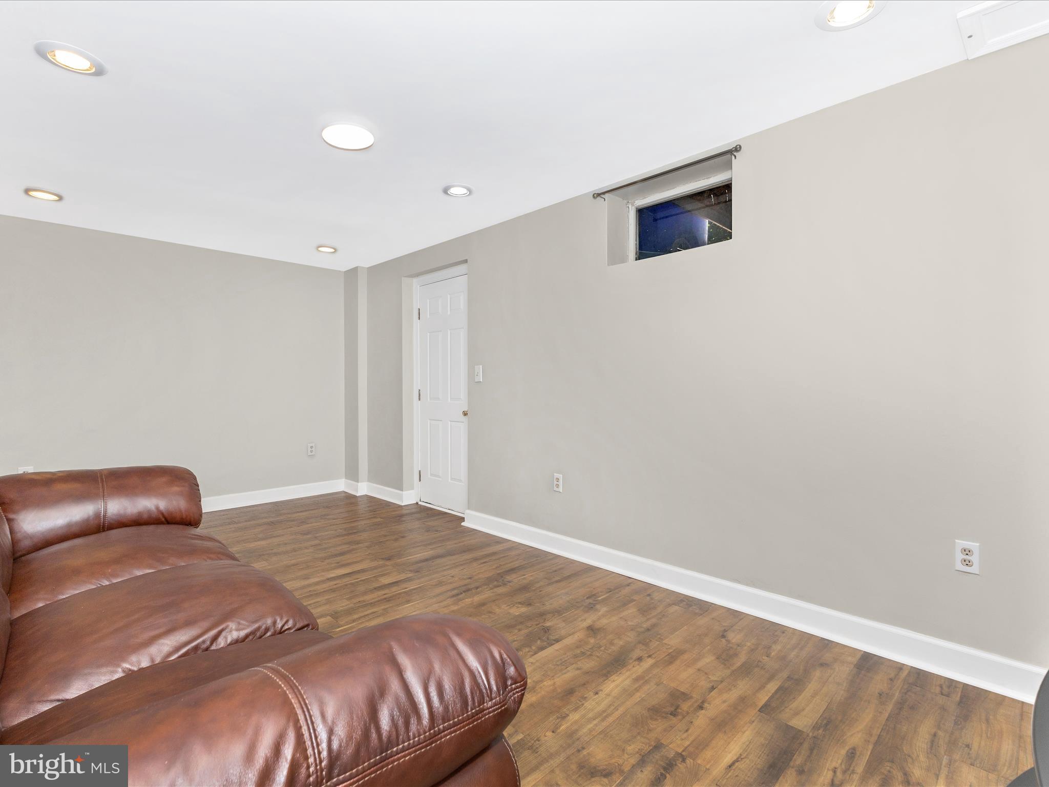 8204 Red Wing Court Frederick, MD 21701 - Photo 32 of 72 a bedroom with a bed and a painting on the wall