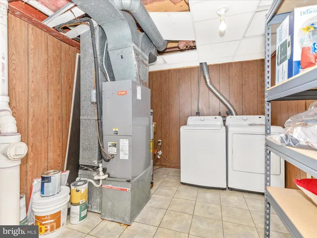 an aerial view of a house with pool lake view and mountain view