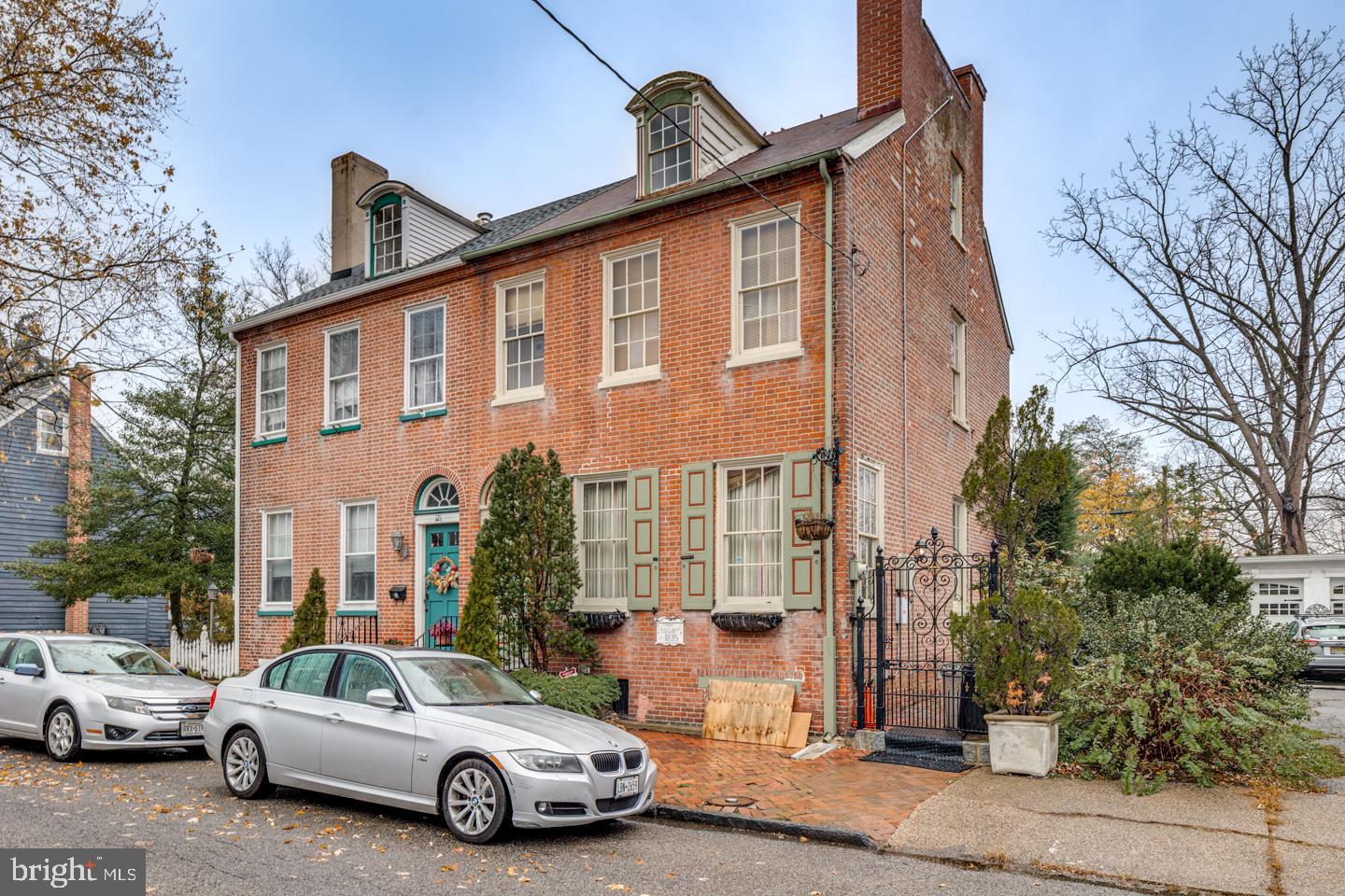 a car parked in front of a house