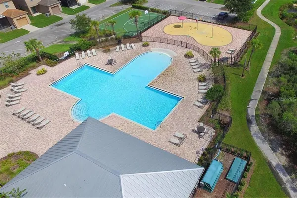 an aerial view of a house with outdoor space