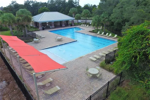 an outdoor space with patio and furniture