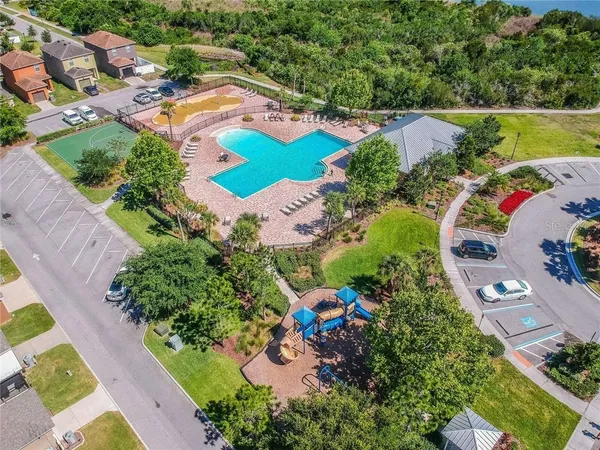 an aerial view of a house with a swimming pool