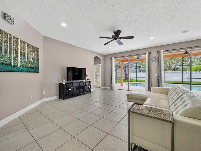 a bathroom with a double vanity sink mirror and toilet