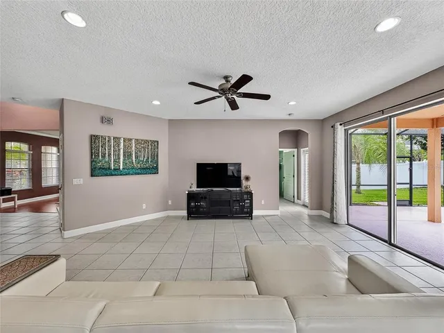 front view of a brick house with a big yard