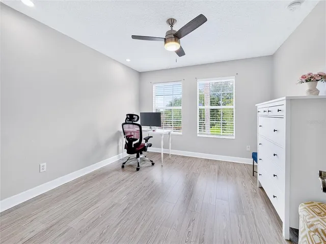 a view of a pathway with a park