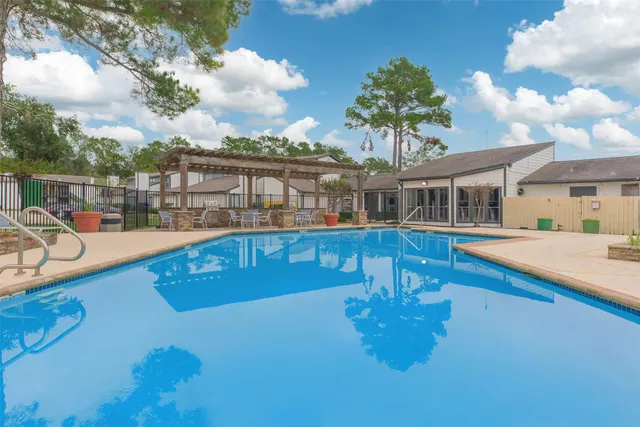 swimming pool with outdoor seating