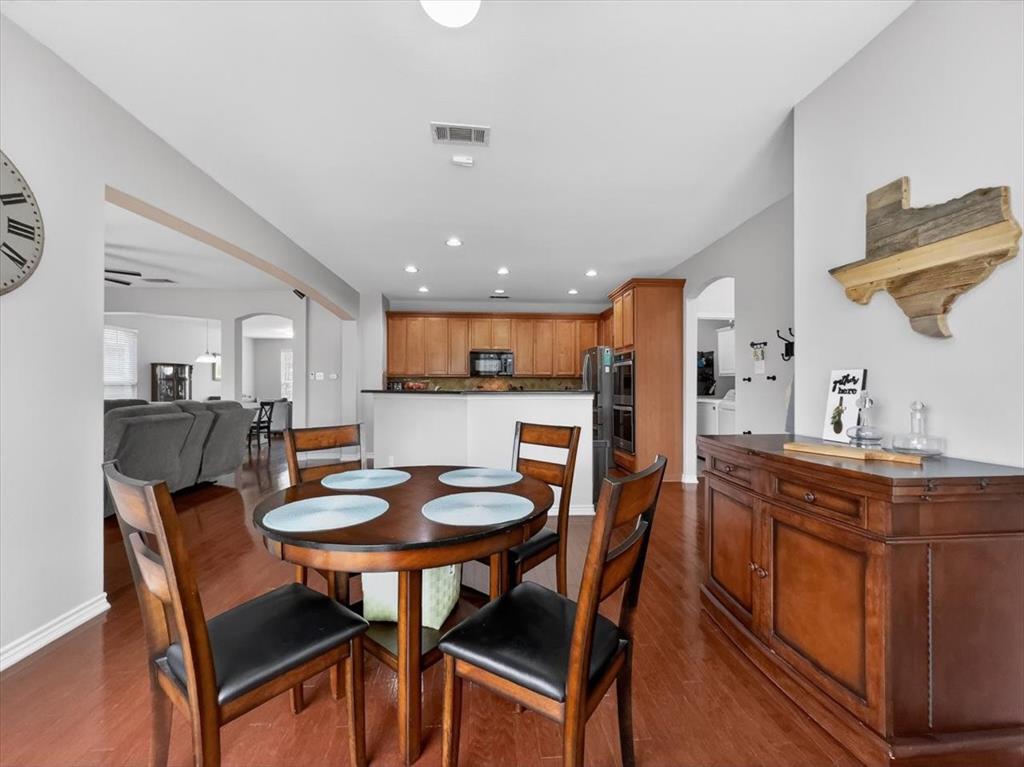 2679 Lake Ridge Drive Little Elm, TX 75068 - Photo 14 of 40 a dining room with furniture and window