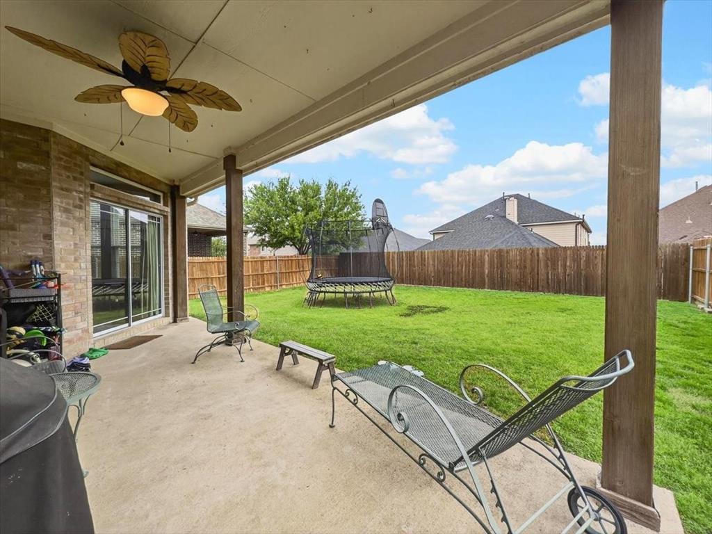 2679 Lake Ridge Drive Little Elm, TX 75068 - Photo 15 of 40 a view of a porch with a backyard