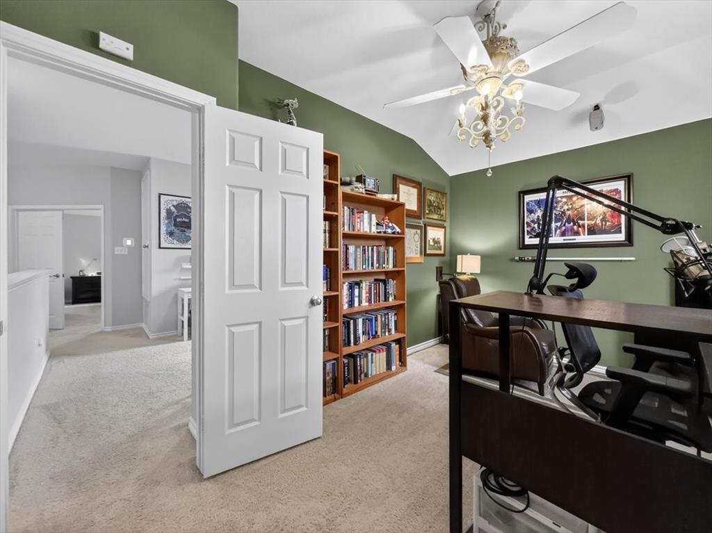2679 Lake Ridge Drive Little Elm, TX 75068 - Photo 26 of 40 a view of a livingroom with furniture and chandelier fan