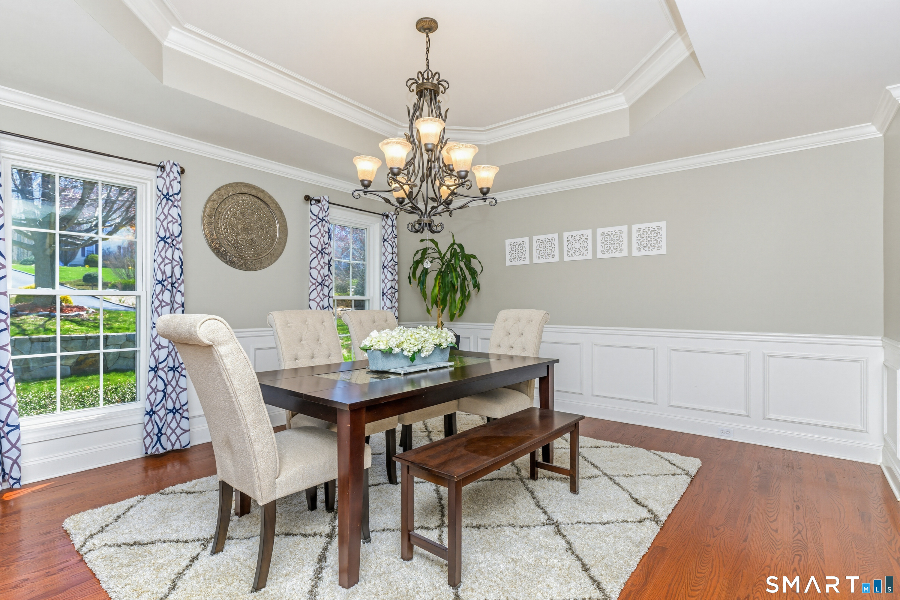 30 Block Farm Road Monroe, CT 06468 - Photo 18 of 40 a dining room with furniture potted plants and wooden floor
