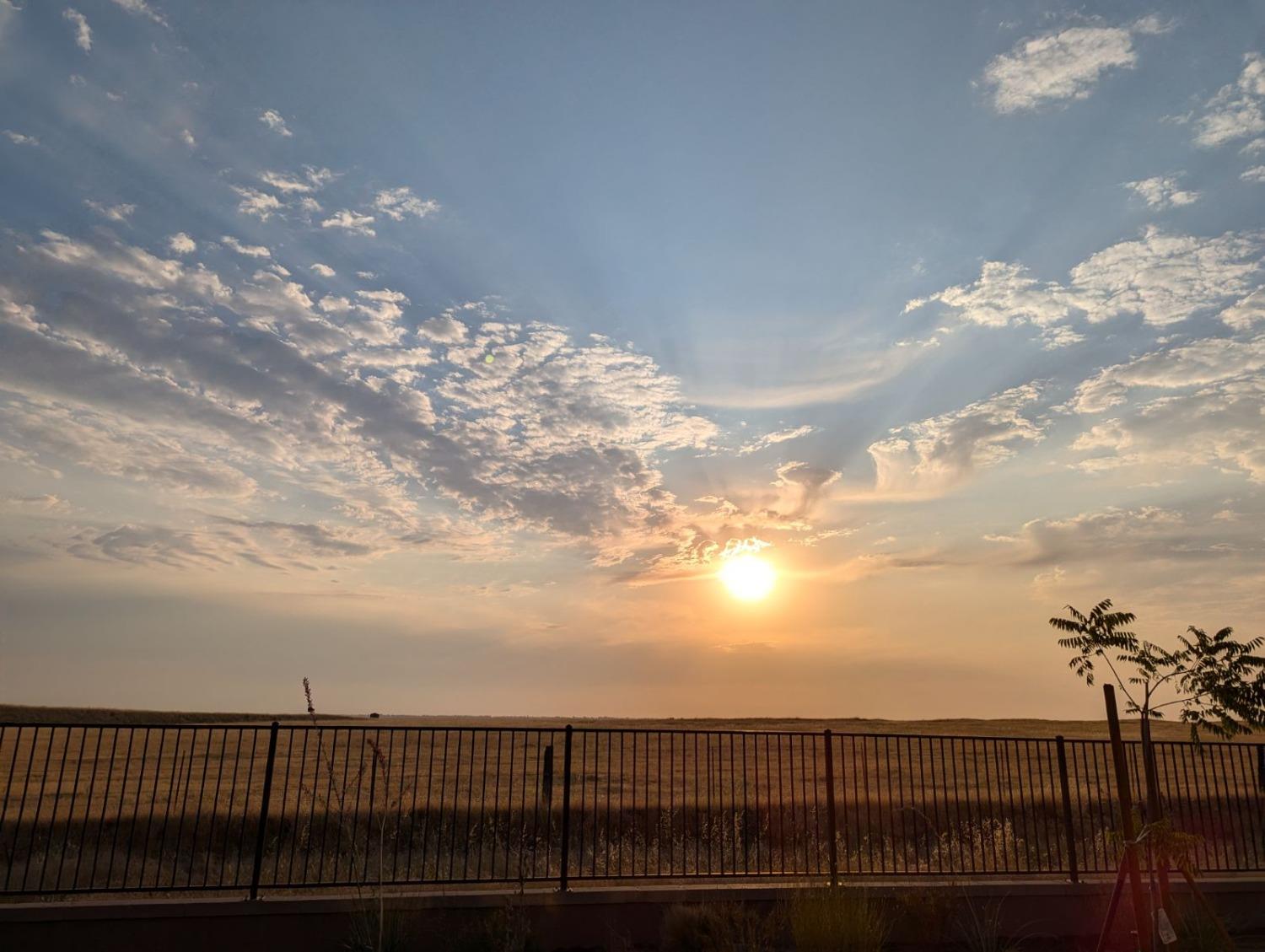 4628 Hillside Road Madera, CA 93636 - Photo 34 of 69 Stunning sunset view from the backyard