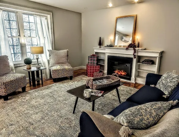 a kitchen with stainless steel appliances granite countertop a stove top oven a sink dishwasher and cabinets with wooden floor