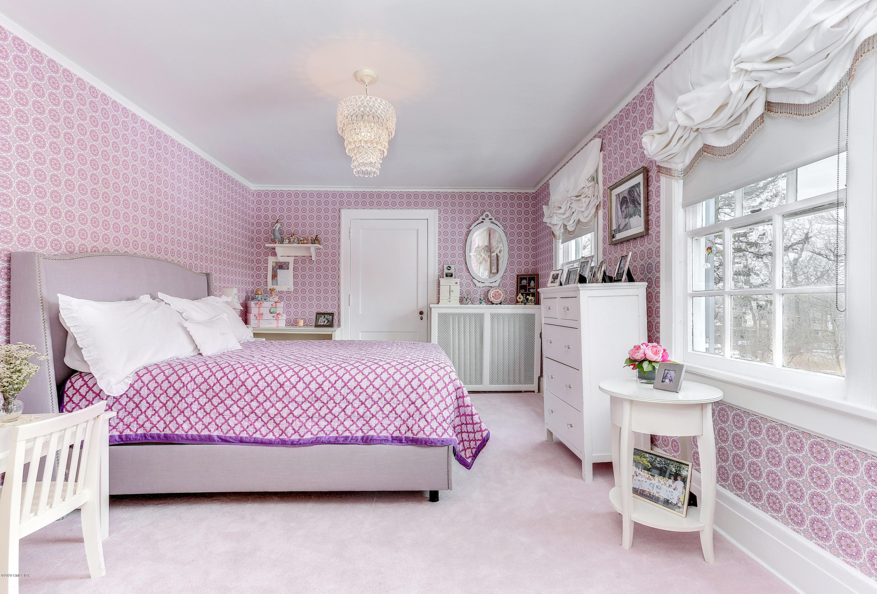 10 Indian Chase Drive Greenwich, CT 06830 - Photo 12 of 27 a bedroom with a bed and dresser