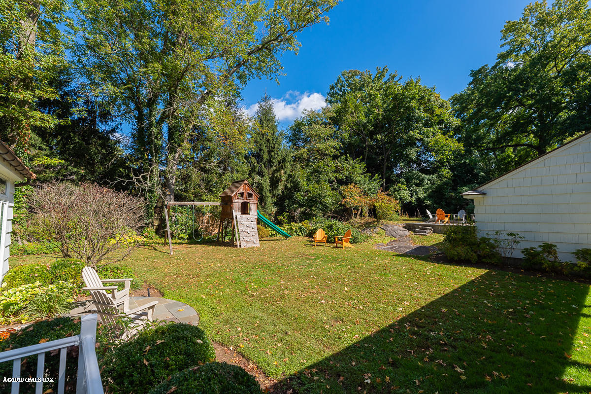 10 Indian Chase Drive Greenwich, CT 06830 - Photo 19 of 27 a view of a backyard