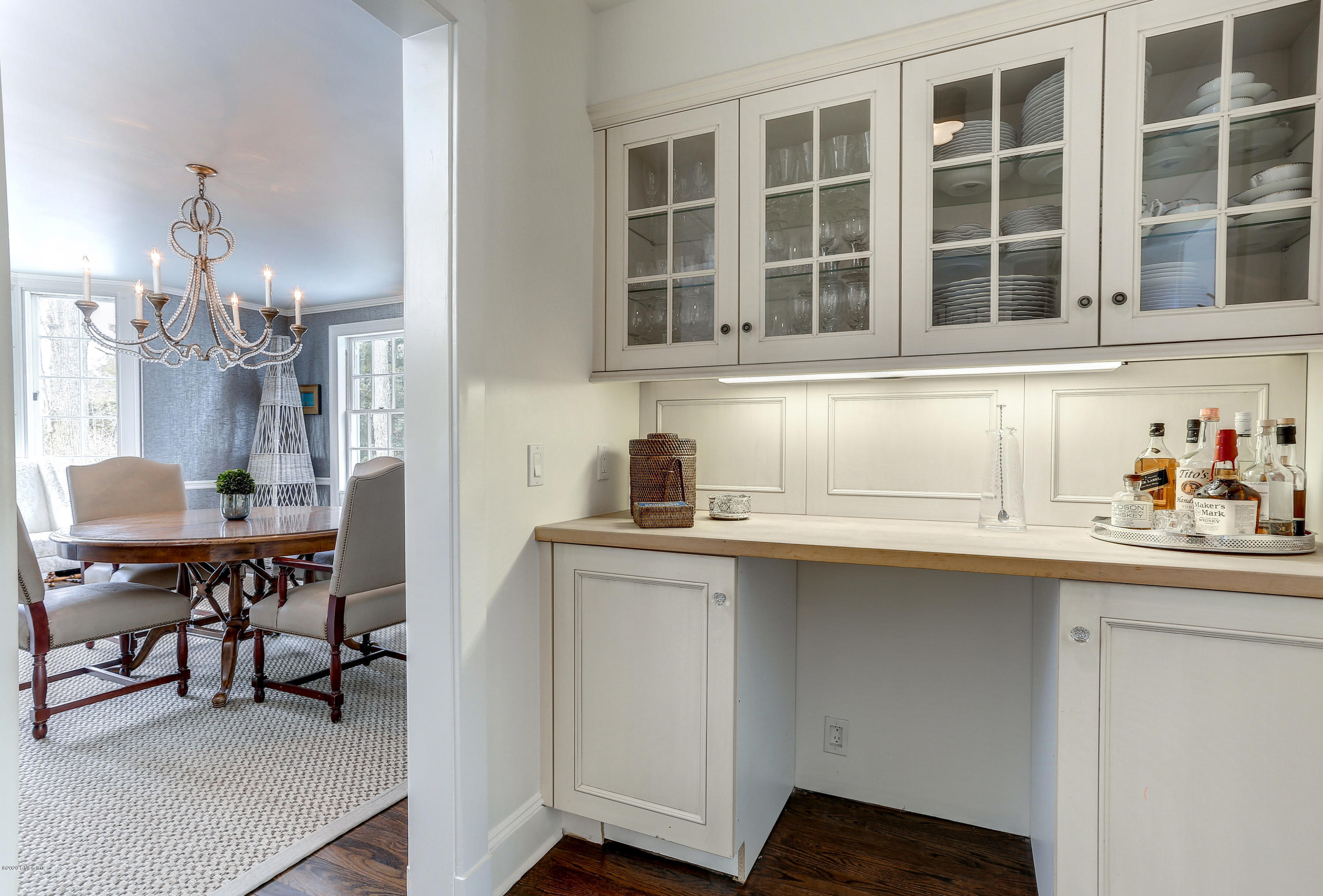 10 Indian Chase Drive Greenwich, CT 06830 - Photo 9 of 27 a kitchen with a sink and cabinets