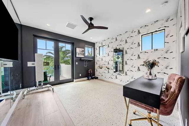 a view of a livingroom with furniture window and wooden floor