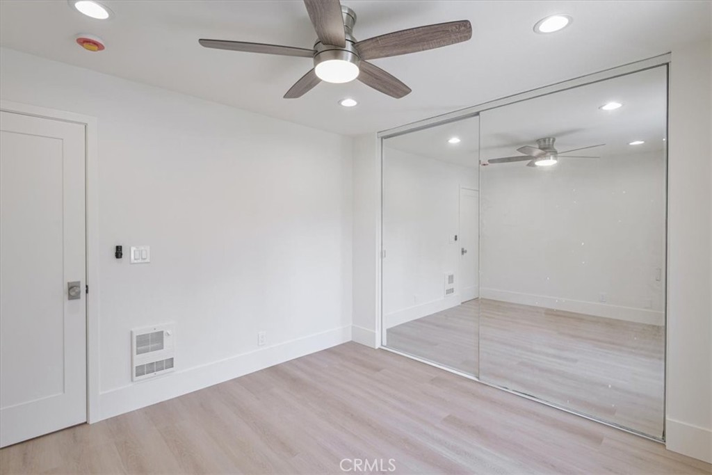 229 Springview Irvine, CA 92620 - Photo 15 of 30 an empty room with fan and entrance