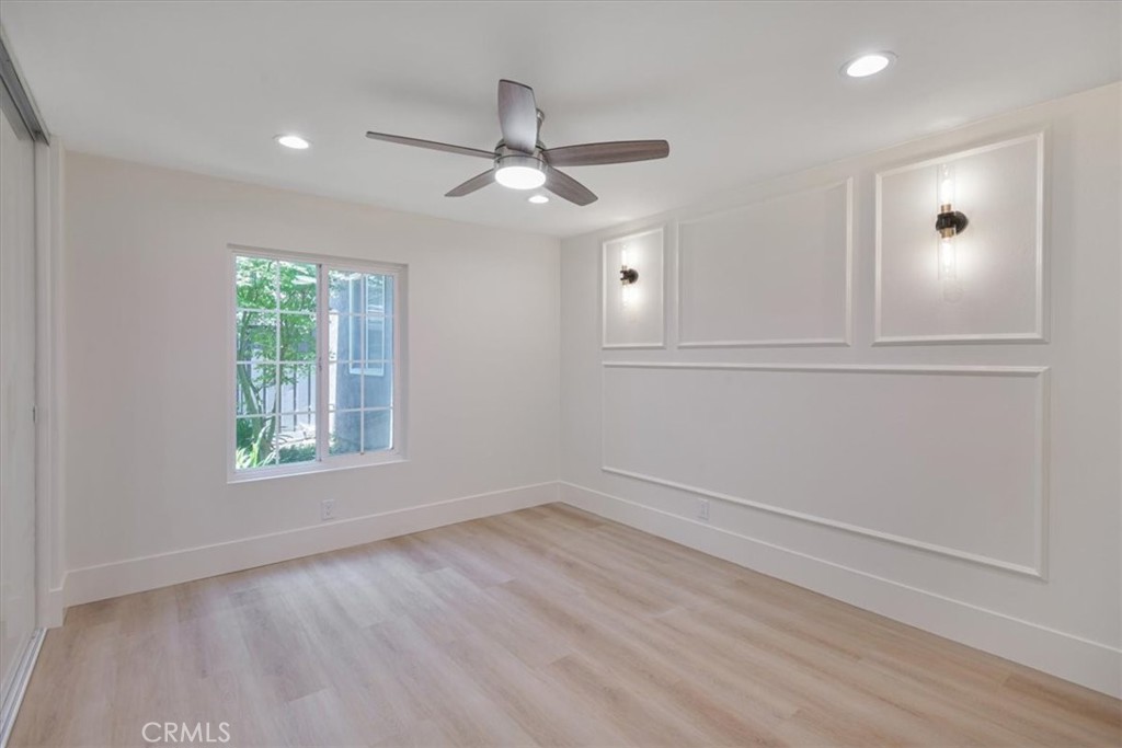 229 Springview Irvine, CA 92620 - Photo 10 of 30 wooden floor in an empty room with a window