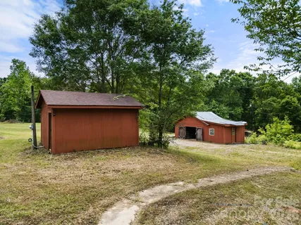 a house with trees in the background