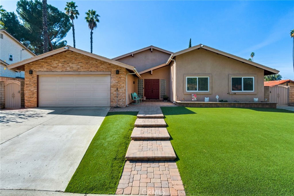 980 Le Conte Drive Riverside, CA 92507 - Photo 1 of 1 a front view of house with yard and green space