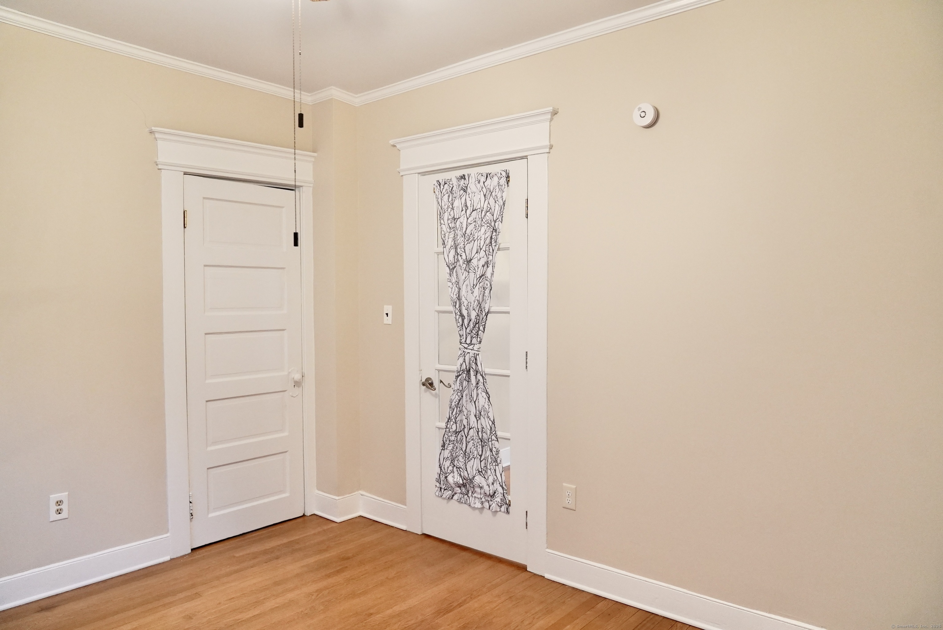 39 Pardee Place New Haven, CT 06515 - Photo 15 of 32 a view of an empty room with wooden floor