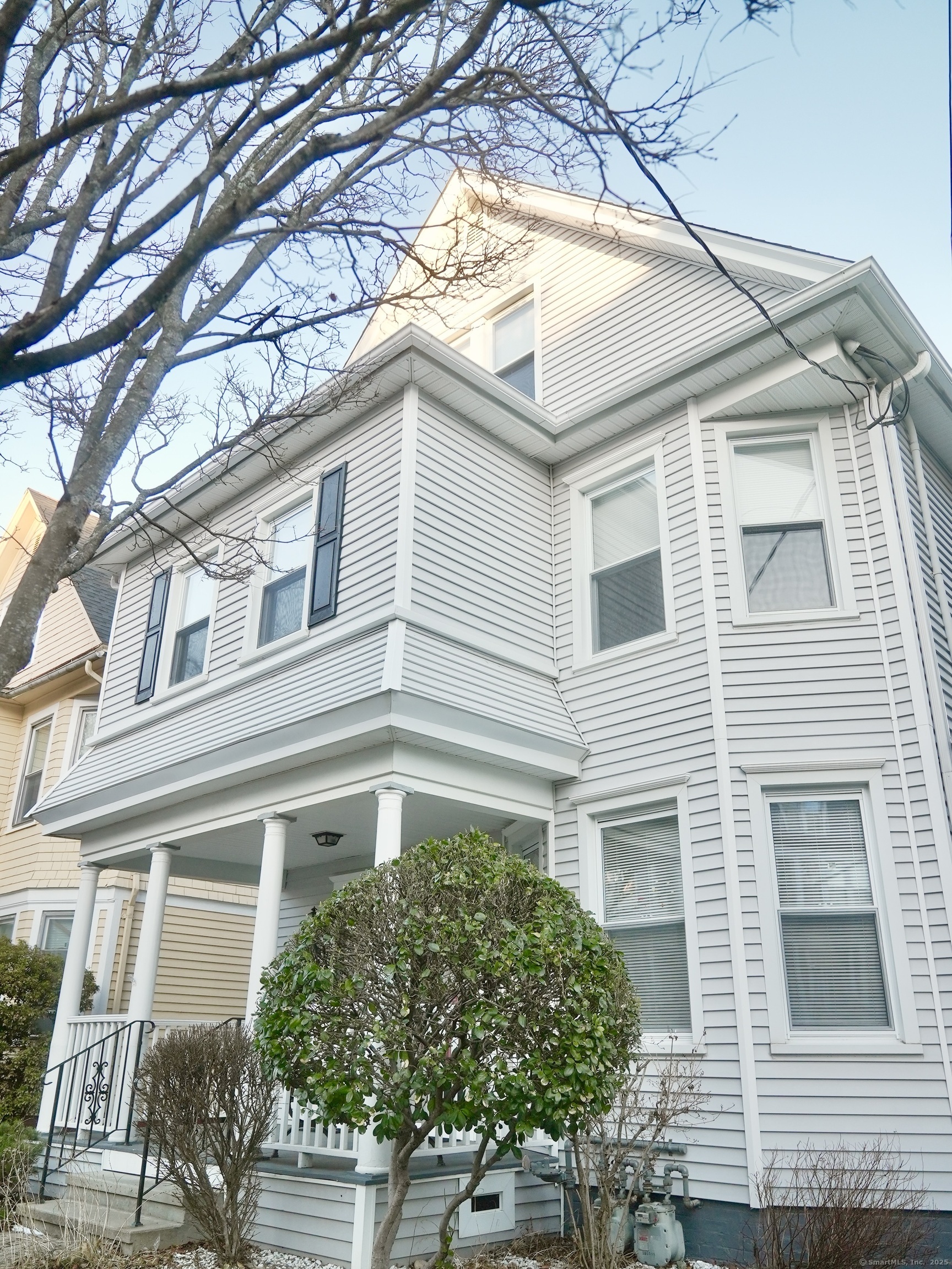 39 Pardee Place New Haven, CT 06515 - Photo 31 of 32 a front view of a house with a tree