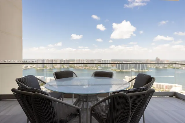 a roof deck with sitting area