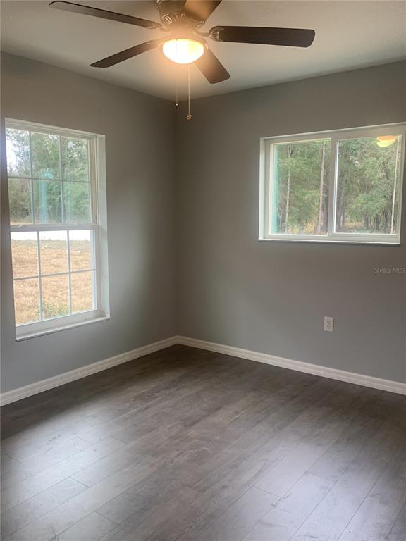 16201 Crider Road Brooksville, FL 34614 - Photo 16 of 18 an empty room with a window