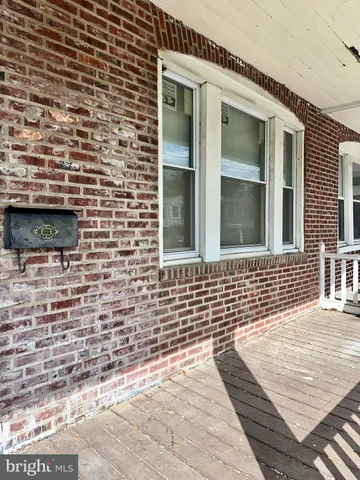 a brick building with a sink