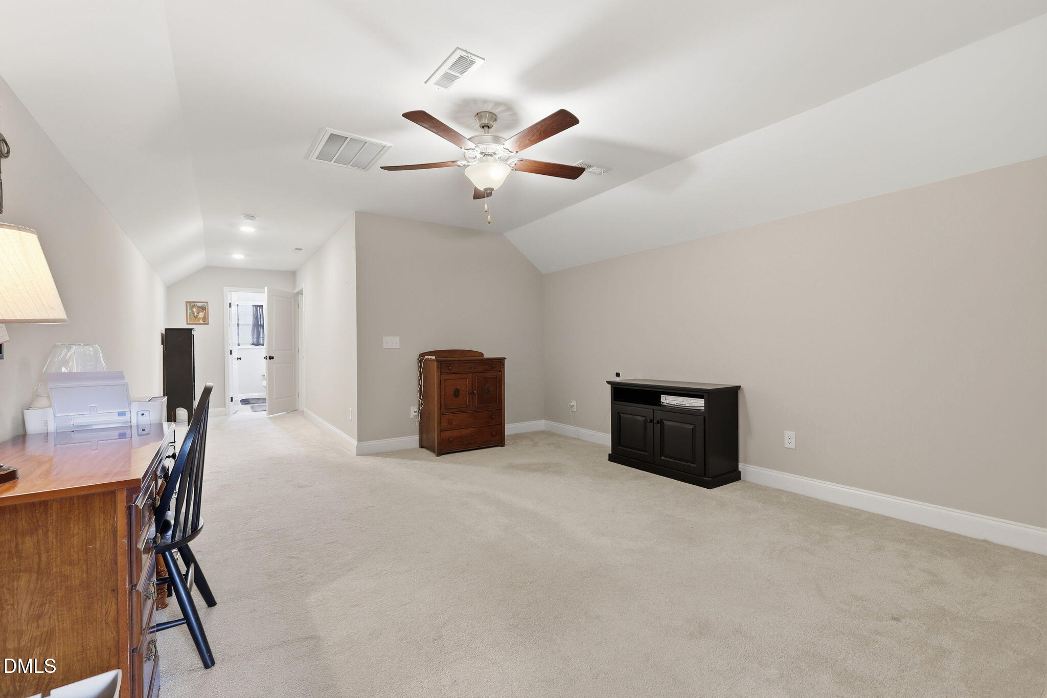 5098 Spring Hill Church Road Lillington, NC 27546 - Photo 26 of 36 a room with furniture and a ceiling fan