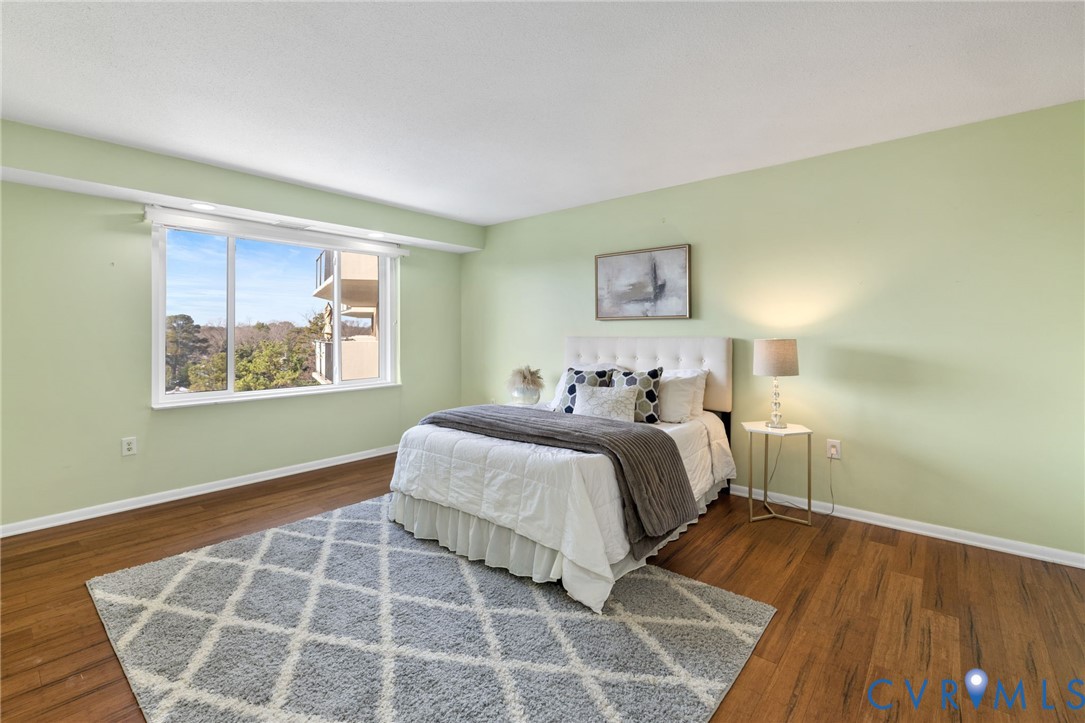 2956 Hathaway Road, Unit 903 Richmond, VA 23225 - Photo 16 of 27 a spacious bedroom with a bed and a window